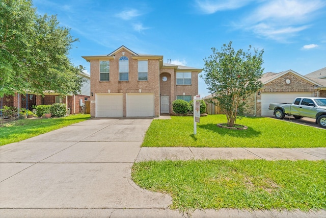 13911 Fraser Lake Ln, Houston, TX 77083 - traditional home featuring driveway, a front yard, brick siding, and a garage