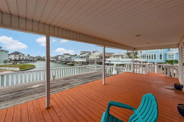 1327 Tiki Dr, Tiki Island, TX 77554 - deck with a residential view and a water view