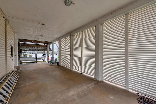 1327 Tiki Dr, Tiki Island, TX 77554 - garage featuring a water view