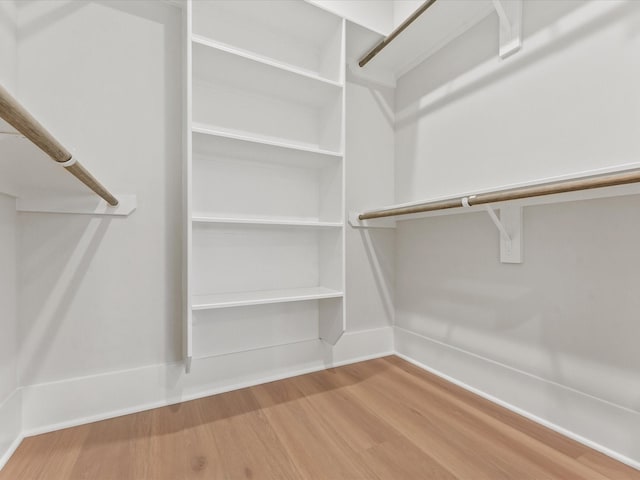 3516 Piney Woods Dr, Houston, TX 77018 - spacious closet featuring wood finished floors
