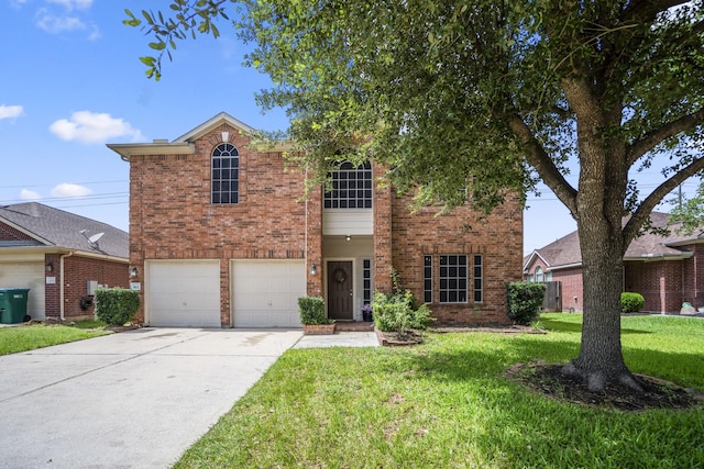 3102 Spring Flower Ln, Spring, TX 77388 - traditional-style home featuring brick siding, concrete driveway, a front lawn, and an attached garage