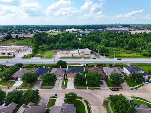 3102 Spring Flower Ln, Spring, TX 77388 - aerial view of property and surrounding area with property parcel outlined and nearby suburban area