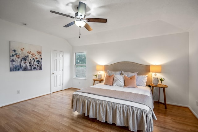 3102 Spring Flower Ln, Spring, TX 77388 - bedroom with wood finished floors, lofted ceiling, baseboards, and ceiling fan