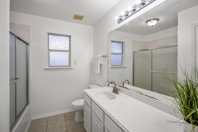 3102 Spring Flower Ln, Spring, TX 77388 - full bath featuring healthy amount of natural light, toilet, vanity, tile patterned flooring, and a textured ceiling