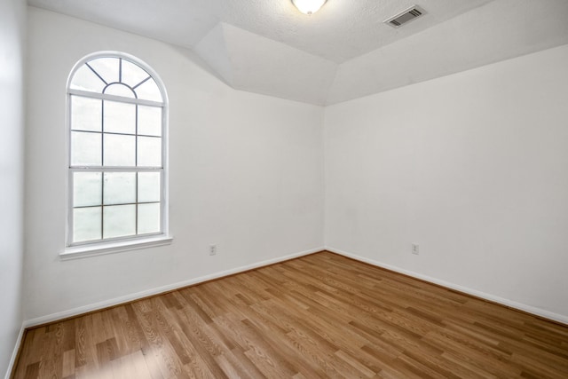 3102 Spring Flower Ln, Spring, TX 77388 - spare room featuring wood finished floors and baseboards