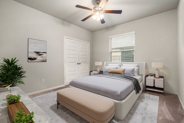 24743 Levante Dr, Richmond, TX 77406 - bedroom featuring carpet flooring, a closet, baseboards, and ceiling fan