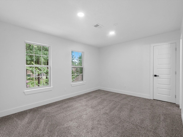 9414 Stockport Dr, Spring, TX 77379 - empty room with carpet, recessed lighting, and baseboards