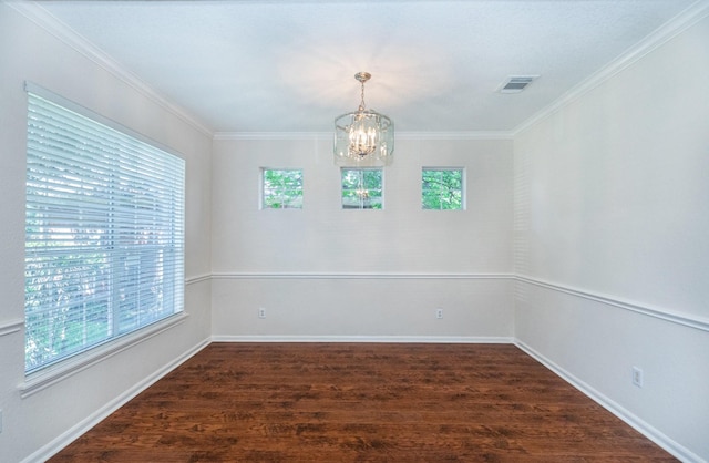 4126 Winesap Bend Dr, Stafford, TX 77477 - spare room with plenty of natural light, a chandelier, dark wood finished floors, ornamental molding, and baseboards