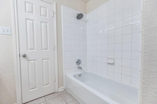 4126 Winesap Bend Dr, Stafford, TX 77477 - full bath with tile patterned floors, washtub / shower combination, and a textured wall