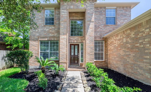 4126 Winesap Bend Dr, Stafford, TX 77477 - entrance to property with brick siding