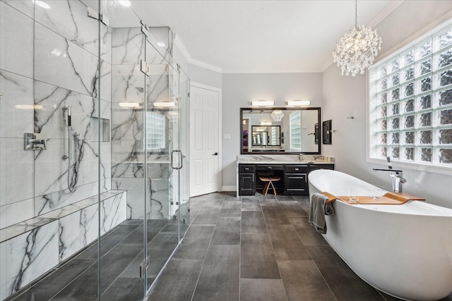 22719 Arbor Stream Dr, Katy, TX 77450 - full bathroom with vanity, a freestanding tub, a marble finish shower, a chandelier, and crown molding