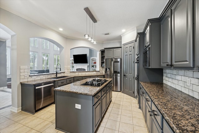 22719 Arbor Stream Dr, Katy, TX 77450 - kitchen with a sink, black appliances, light tile patterned floors, gray cabinets, and crown molding