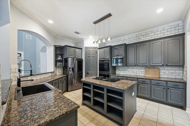 22719 Arbor Stream Dr, Katy, TX 77450 - kitchen with open shelves, black appliances, a sink, crown molding, and a center island