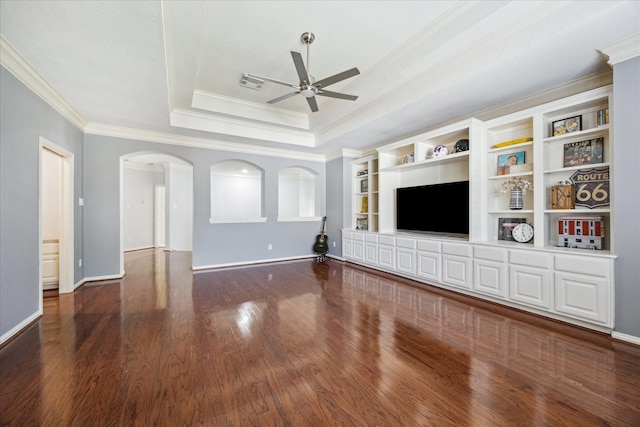 22719 Arbor Stream Dr, Katy, TX 77450 - unfurnished living room featuring a ceiling fan, arched walkways, wood finished floors, crown molding, and baseboards