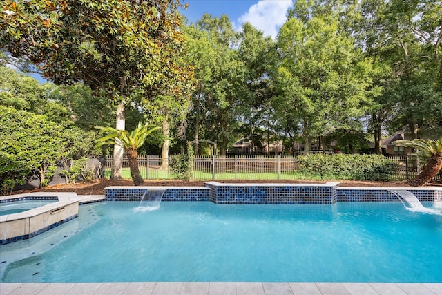 22719 Arbor Stream Dr, Katy, TX 77450 - view of swimming pool featuring a fenced backyard and a pool with connected hot tub
