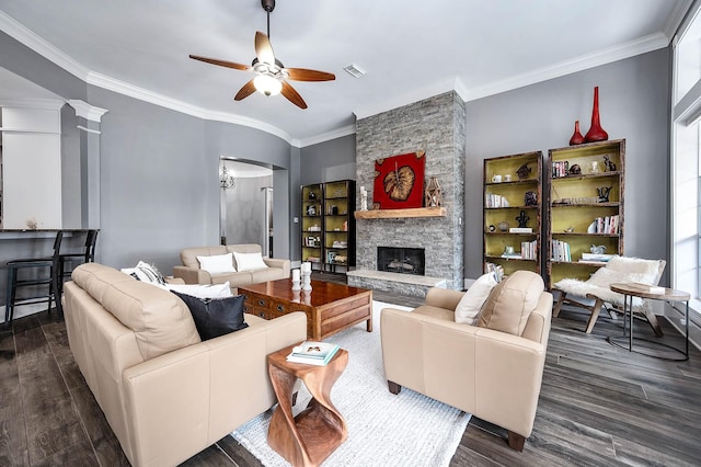 4322 Cannondale Ln, Katy, TX 77450 - living room with ceiling fan, wood finished floors, crown molding, and a stone fireplace
