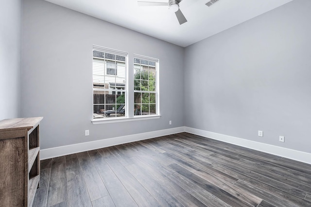 4322 Cannondale Ln, Katy, TX 77450 - empty room featuring dark wood-type flooring, baseboards, and ceiling fan