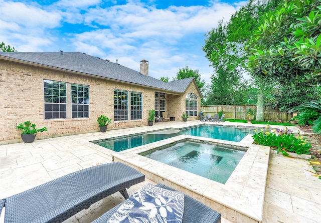 4322 Cannondale Ln, Katy, TX 77450 - view of pool featuring a patio, a fenced backyard, and a pool with connected hot tub