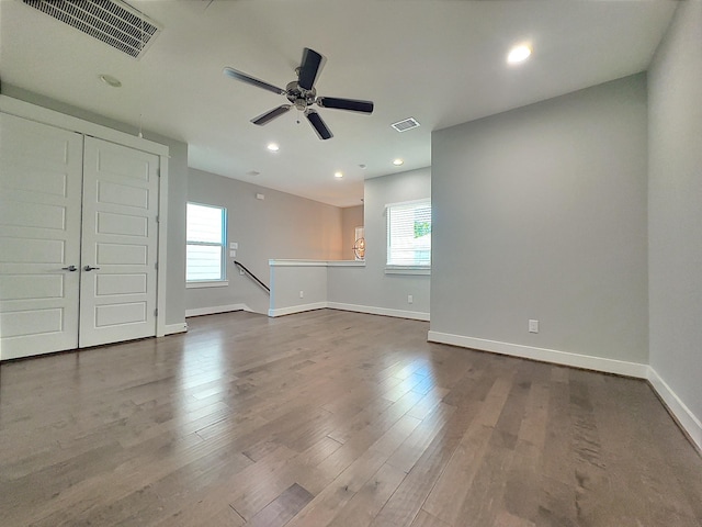 418 Yale Oaks Ln, Houston, TX 77091 - empty room with baseboards, ceiling fan, recessed lighting, and dark wood finished floors