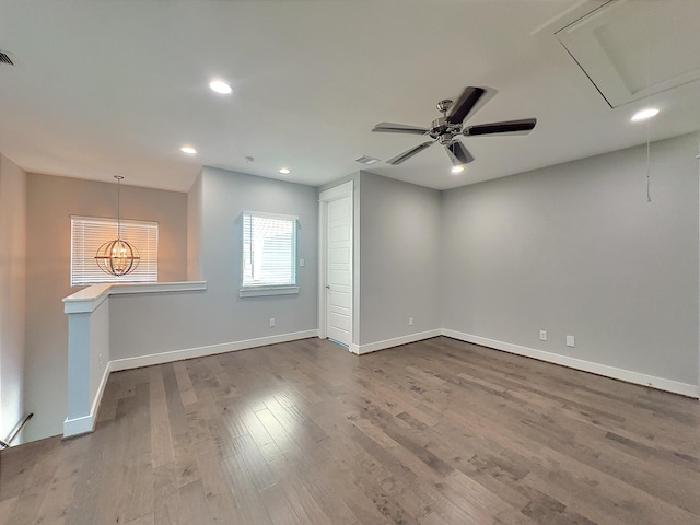 418 Yale Oaks Ln, Houston, TX 77091 - spare room featuring dark wood finished floors, baseboards, recessed lighting, a ceiling fan, and attic access
