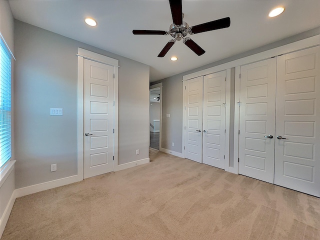 418 Yale Oaks Ln, Houston, TX 77091 - unfurnished bedroom featuring two closets, carpet flooring, recessed lighting, and baseboards