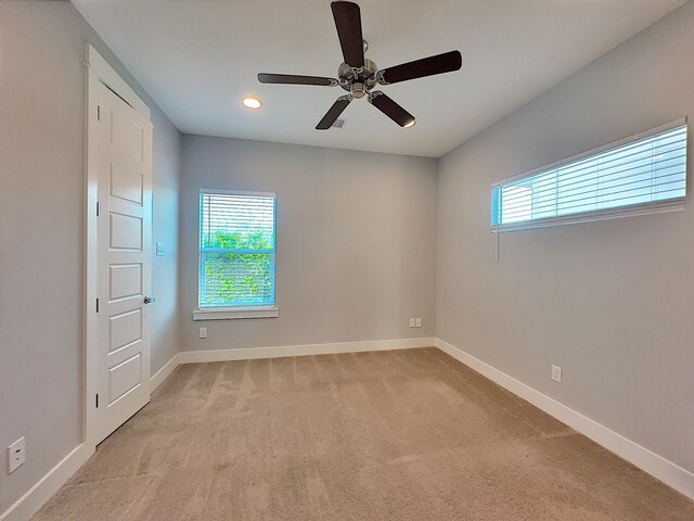 418 Yale Oaks Ln, Houston, TX 77091 - spare room featuring ceiling fan, baseboards, light colored carpet, and recessed lighting