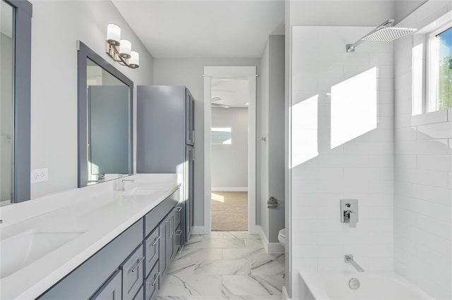 418 Yale Oaks Ln, Houston, TX 77091 - full bathroom with marble finish flooring, shower / bath combination, double vanity, toilet, and baseboards