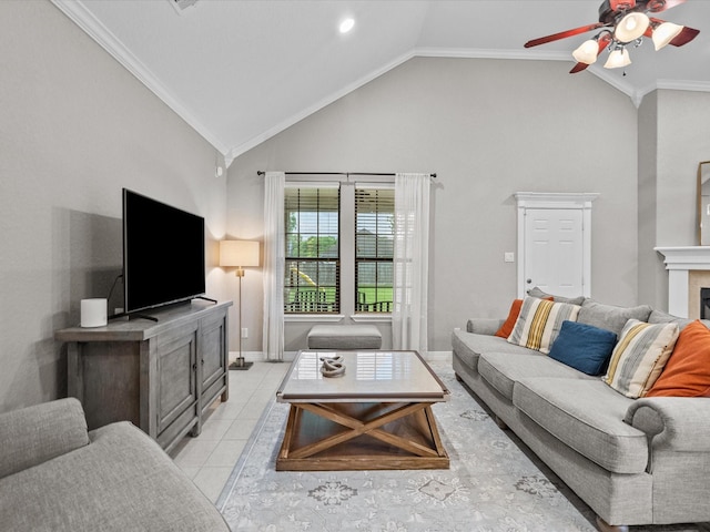 12008 7th St, Santa Fe, TX 77510 - living room featuring ceiling fan, a tile fireplace, high vaulted ceiling, light tile patterned floors, and ornamental molding