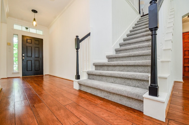 7919 Clarion Way, Houston, TX 77040 - foyer featuring ornamental molding, stairway, hardwood / wood-style floors, and baseboards