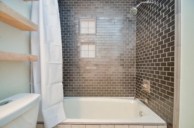 7919 Clarion Way, Houston, TX 77040 - full bathroom featuring tiled shower / bath and toilet