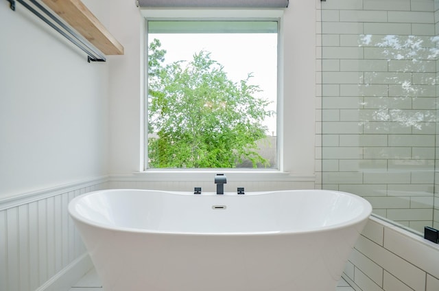 7919 Clarion Way, Houston, TX 77040 - full bathroom with a freestanding bath and healthy amount of natural light