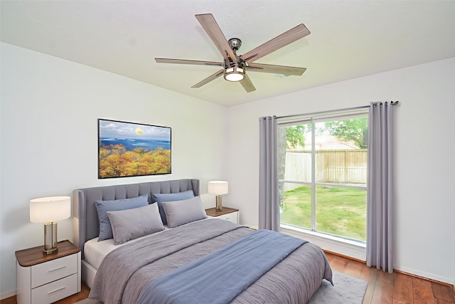 7919 Clarion Way, Houston, TX 77040 - bedroom featuring wood finished floors, baseboards, and a ceiling fan