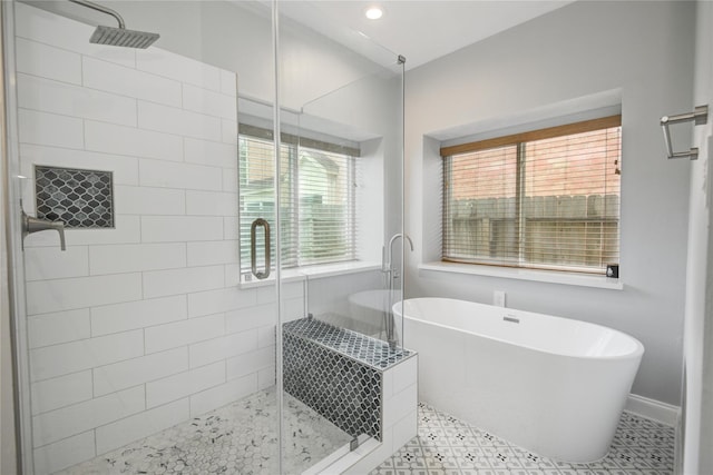 14130 Glasgow Pl, Houston, TX 77077 - full bath with a freestanding bath, a shower stall, recessed lighting, and baseboards