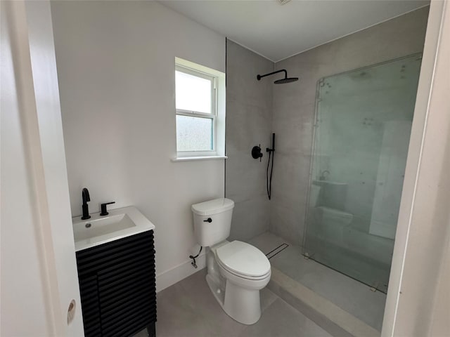 5005 Chestnut St, Bellaire, TX 77401 - bathroom with toilet, a shower, and vanity