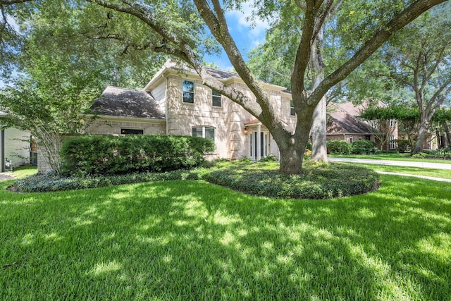 16907 Misty Creek Dr, Spring, TX 77379 - view of front of house with a front yard