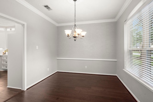 16907 Misty Creek Dr, Spring, TX 77379 - empty room featuring dark wood-style floors, crown molding, a chandelier, and baseboards