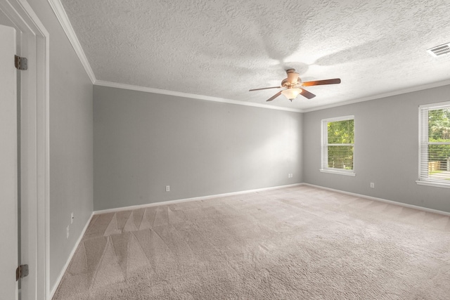 16907 Misty Creek Dr, Spring, TX 77379 - carpeted spare room with a ceiling fan, ornamental molding, baseboards, and a textured ceiling