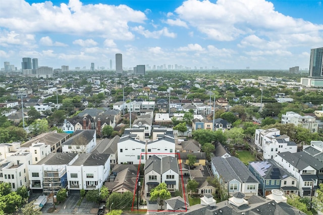 1724 Ridgewood St, Houston, TX 77006 - aerial perspective of suburban area featuring property parcel outlined and city skyline