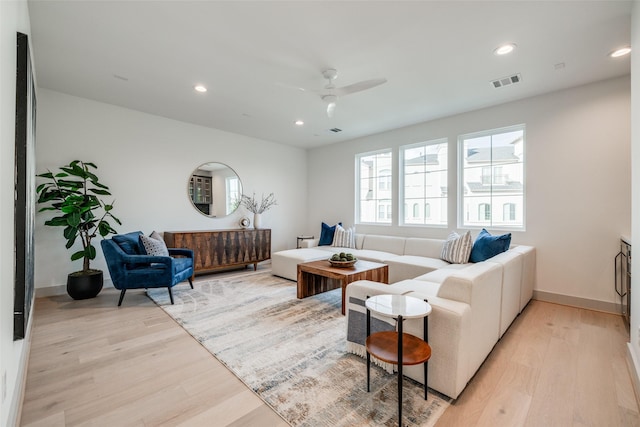 1724 Ridgewood St, Houston, TX 77006 - living room with light wood finished floors, ceiling fan, recessed lighting, and baseboards