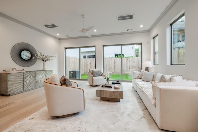 1724 Ridgewood St, Houston, TX 77006 - living room with ornamental molding, light wood-type flooring, a ceiling fan, and recessed lighting