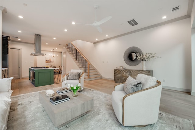 1724 Ridgewood St, Houston, TX 77006 - living area featuring stairs, recessed lighting, light wood-type flooring, baseboards, and a ceiling fan