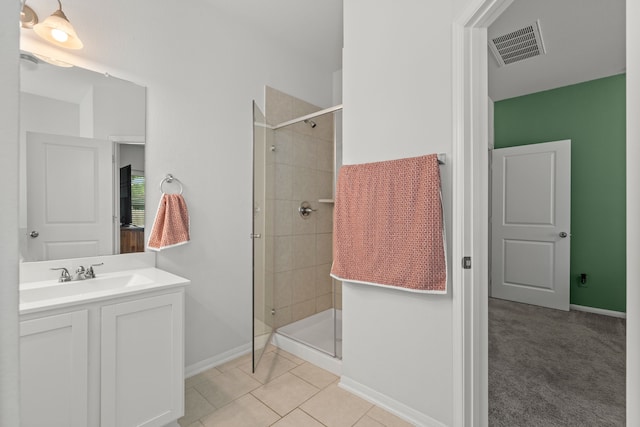 7315 Parkview Dr, Hitchcock, TX 77563 - bathroom featuring a shower stall, vanity, baseboards, and tile patterned flooring
