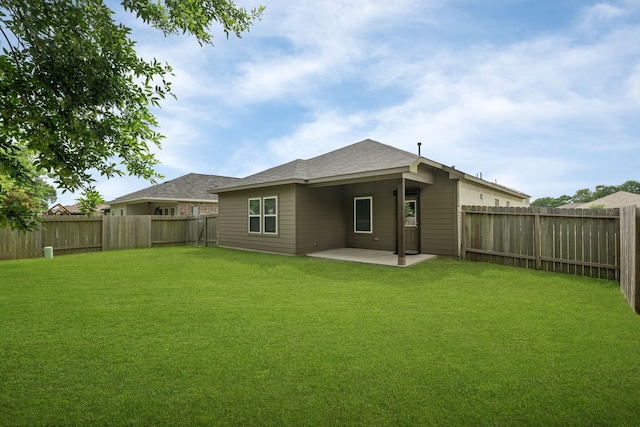 7315 Parkview Dr, Hitchcock, TX 77563 - rear view of house with a patio area and a shingled roof