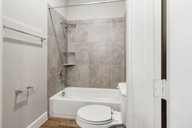 11439 Bush Clover Dr, Cypress, TX 77433 - full bath featuring toilet, tub / shower combination, wood finished floors, and baseboards