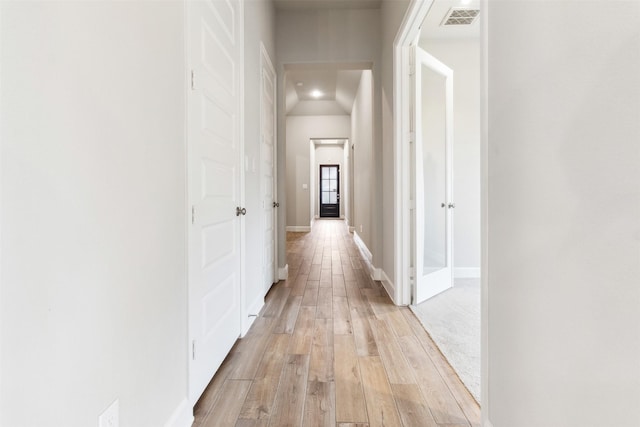 11439 Bush Clover Dr, Cypress, TX 77433 - corridor featuring light wood-style floors and baseboards