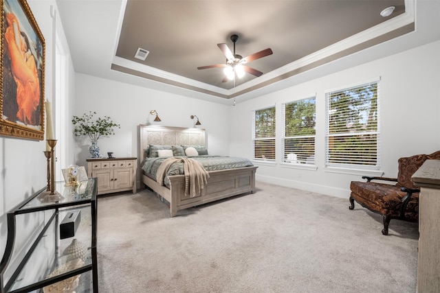 308 Lane Landing Pl, Montgomery, TX 77316 - bedroom featuring a raised ceiling, light carpet, baseboards, ceiling fan, and ornamental molding