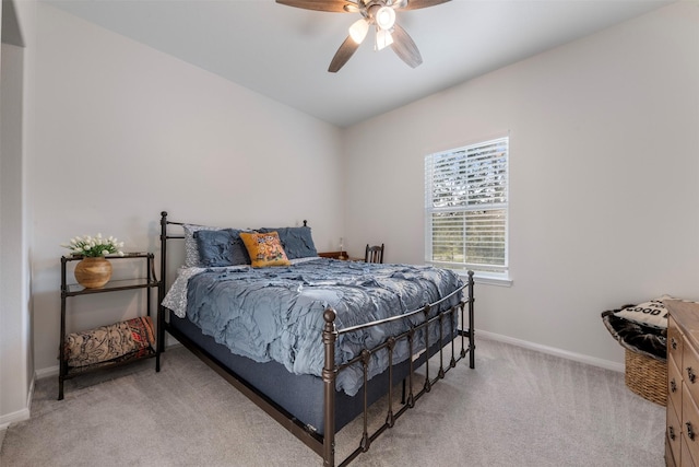 308 Lane Landing Pl, Montgomery, TX 77316 - bedroom with light colored carpet, baseboards, and a ceiling fan