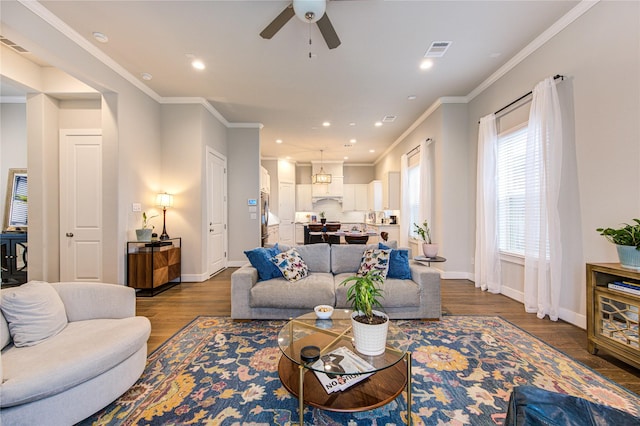 10918 Brookeshire Chase Ln, Houston, TX 77043 - living room featuring dark wood-style flooring, a ceiling fan, baseboards, recessed lighting, and ornamental molding