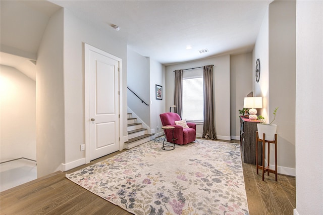 10918 Brookeshire Chase Ln, Houston, TX 77043 - living area with wood finished floors, stairs, and baseboards