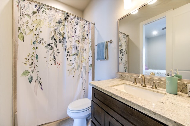 10918 Brookeshire Chase Ln, Houston, TX 77043 - bathroom with vanity, toilet, and a shower with shower curtain
